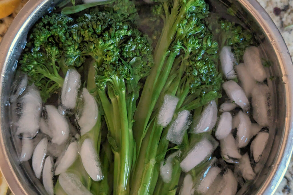 Broccoletti in an ice bowl.