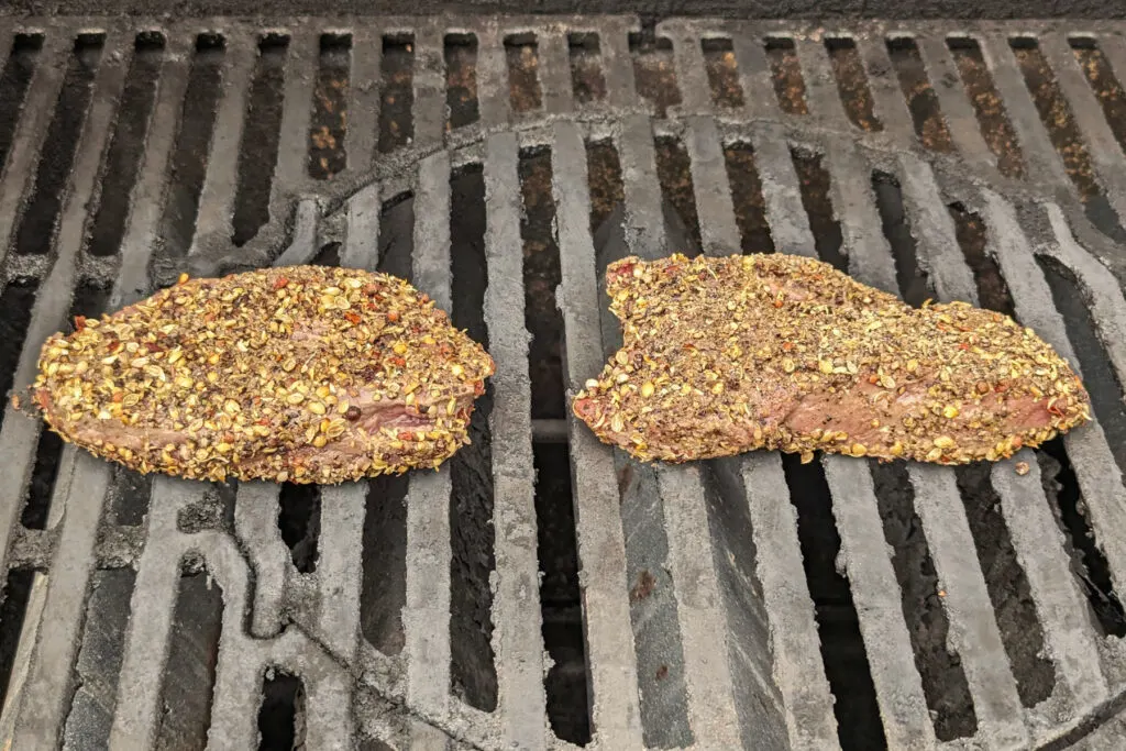 Bison steaks on the grill.