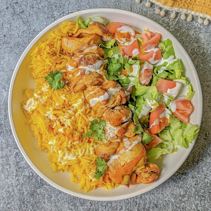 Halal Chicken Over Rice in a serving bowl.