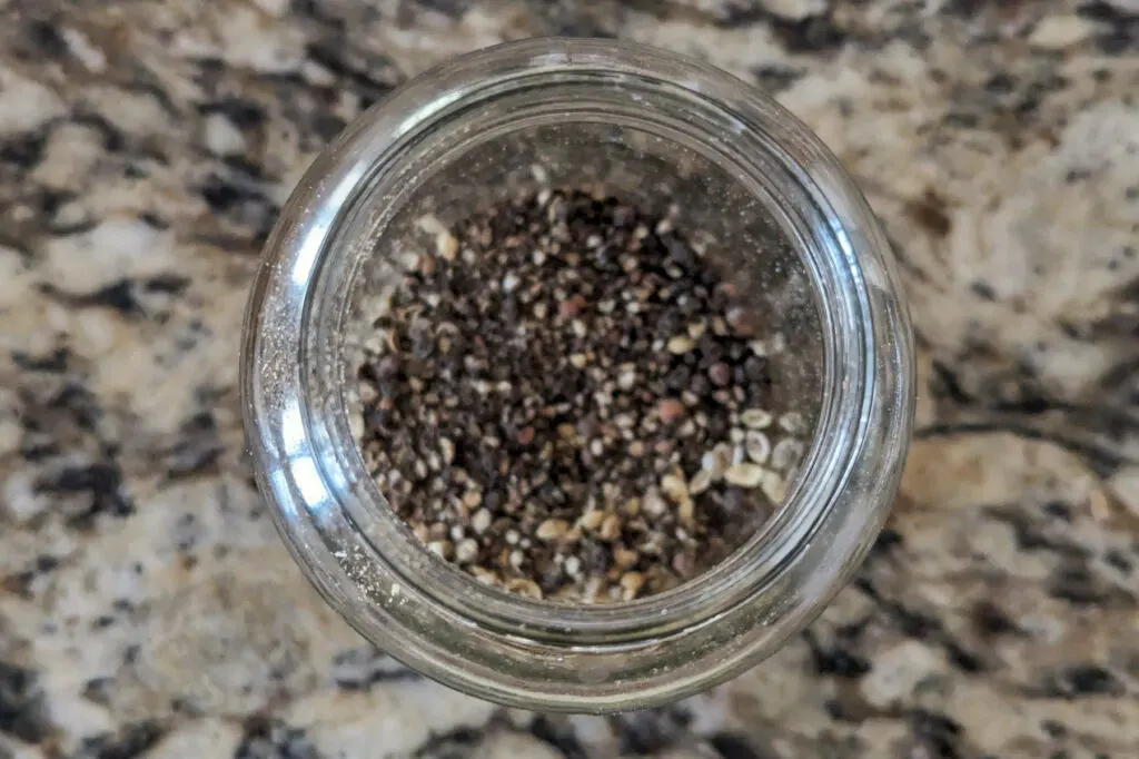 Peppercorn and coriander in a jar.