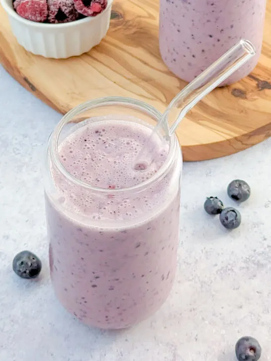 Raspberry Blueberry Smoothie in a drinking glass.