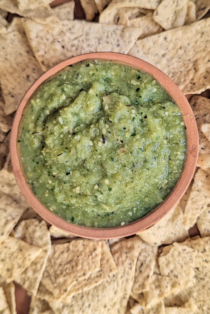 Salsa Verde with Tomatillo in a dish with chips.