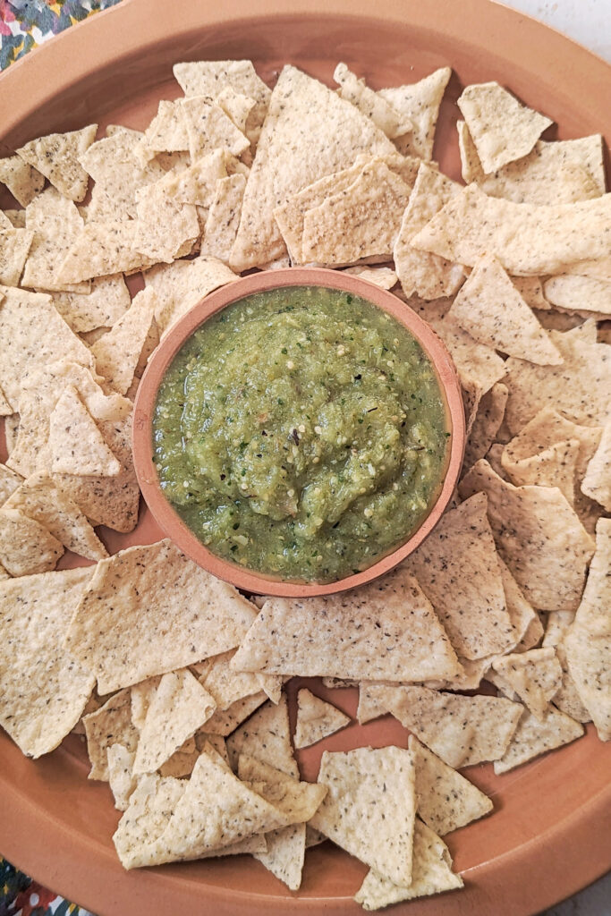 Salsa verde with tomatillo in a dish.