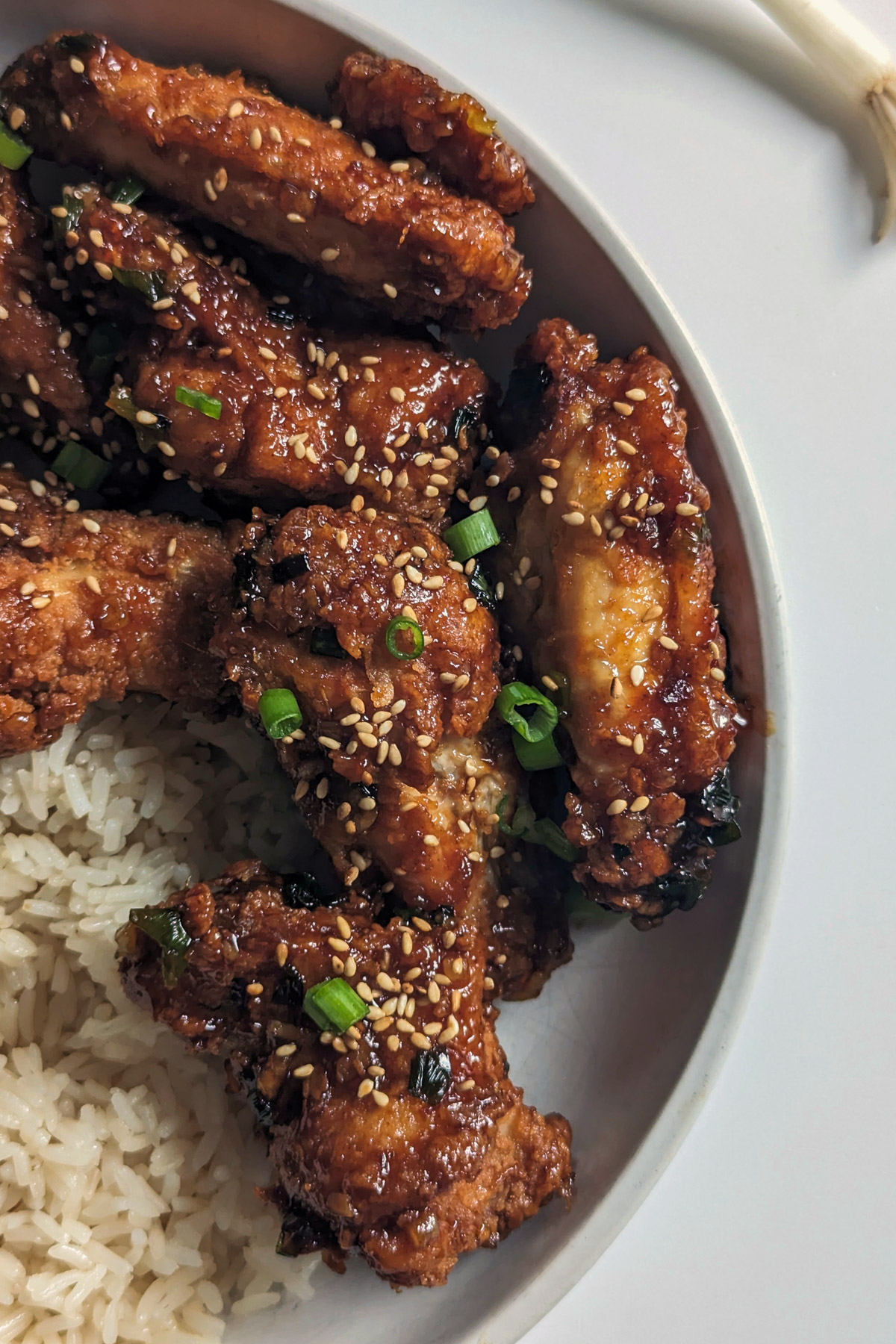 Soy garlic chicken wings in a serving bowl.