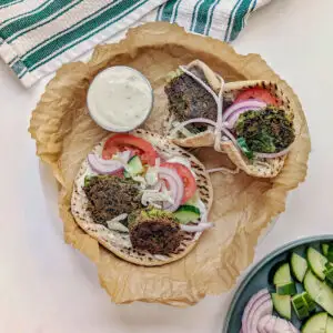 Falafel gyro on a plate.