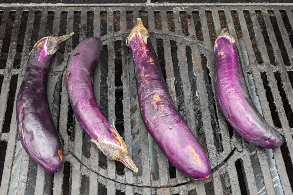 Eggplants grilling on the grill.