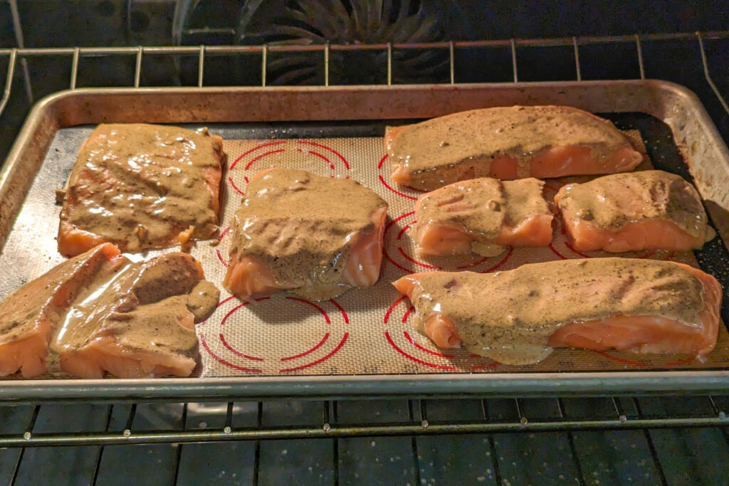 Ancho salmon broiling in the oven.