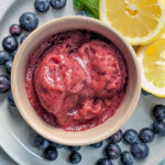Blueberry peach sorbet in a bowl.