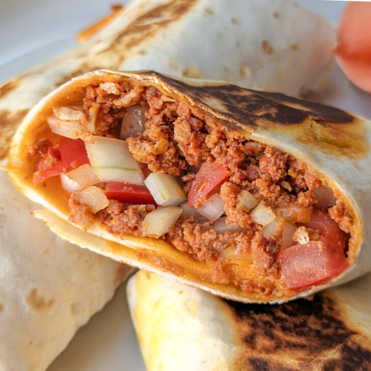 A chorizo burrito on a plate.