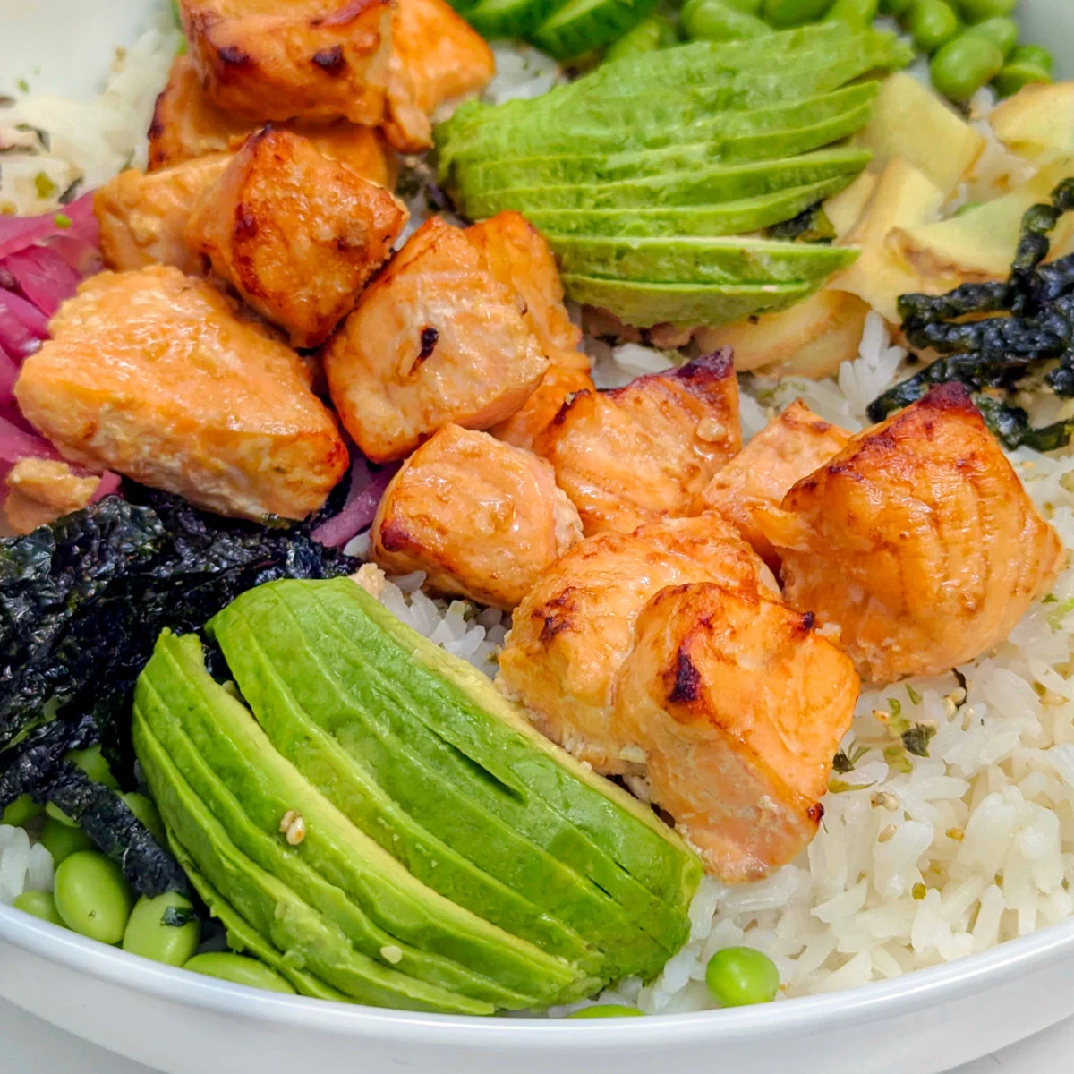 Air fryer salmon bowls in a serving bowl.