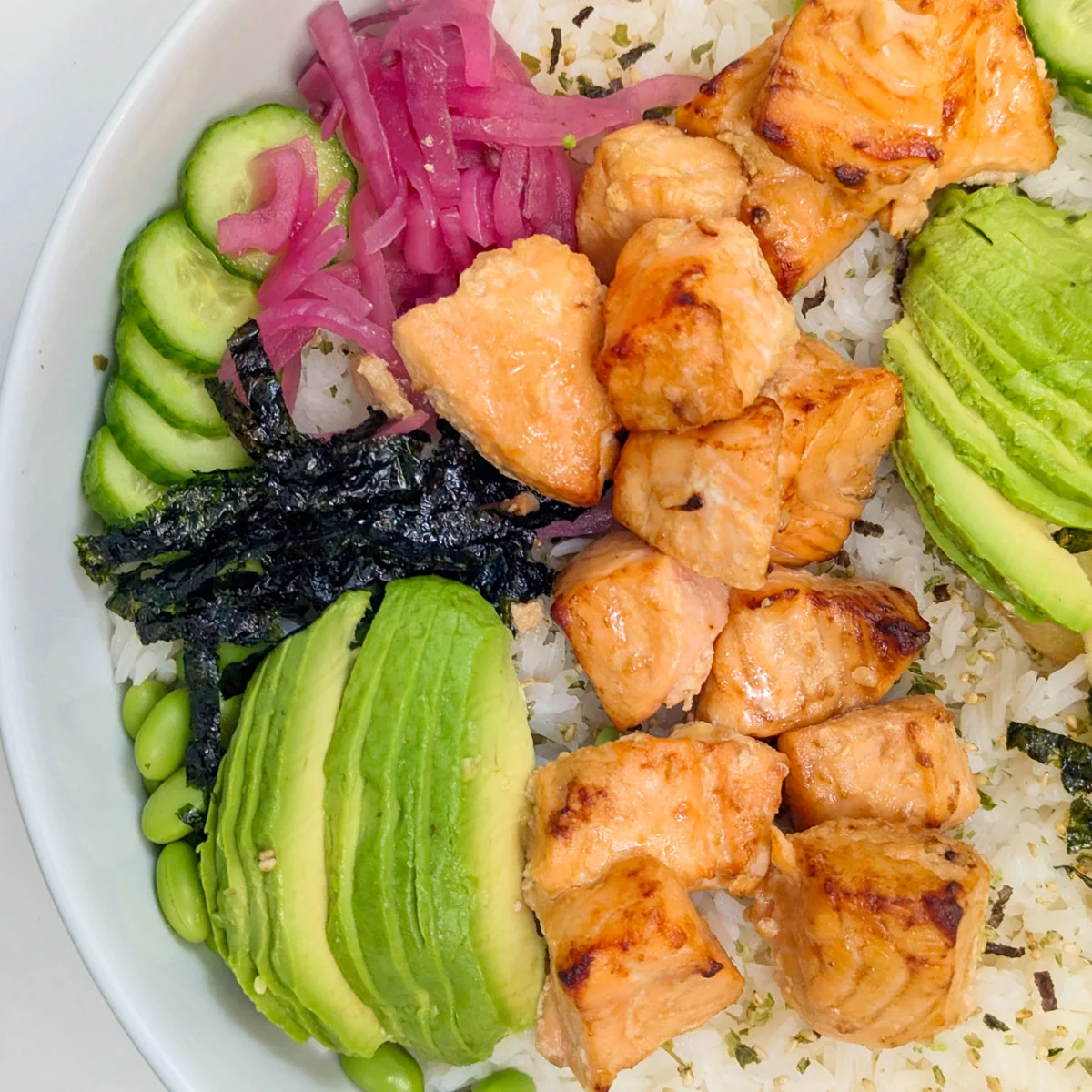 Air fryer salmon bowls in a serving bowl.