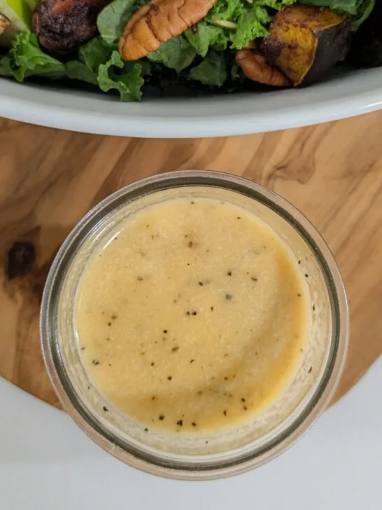Maple dijon dressing in a serving bowl.
