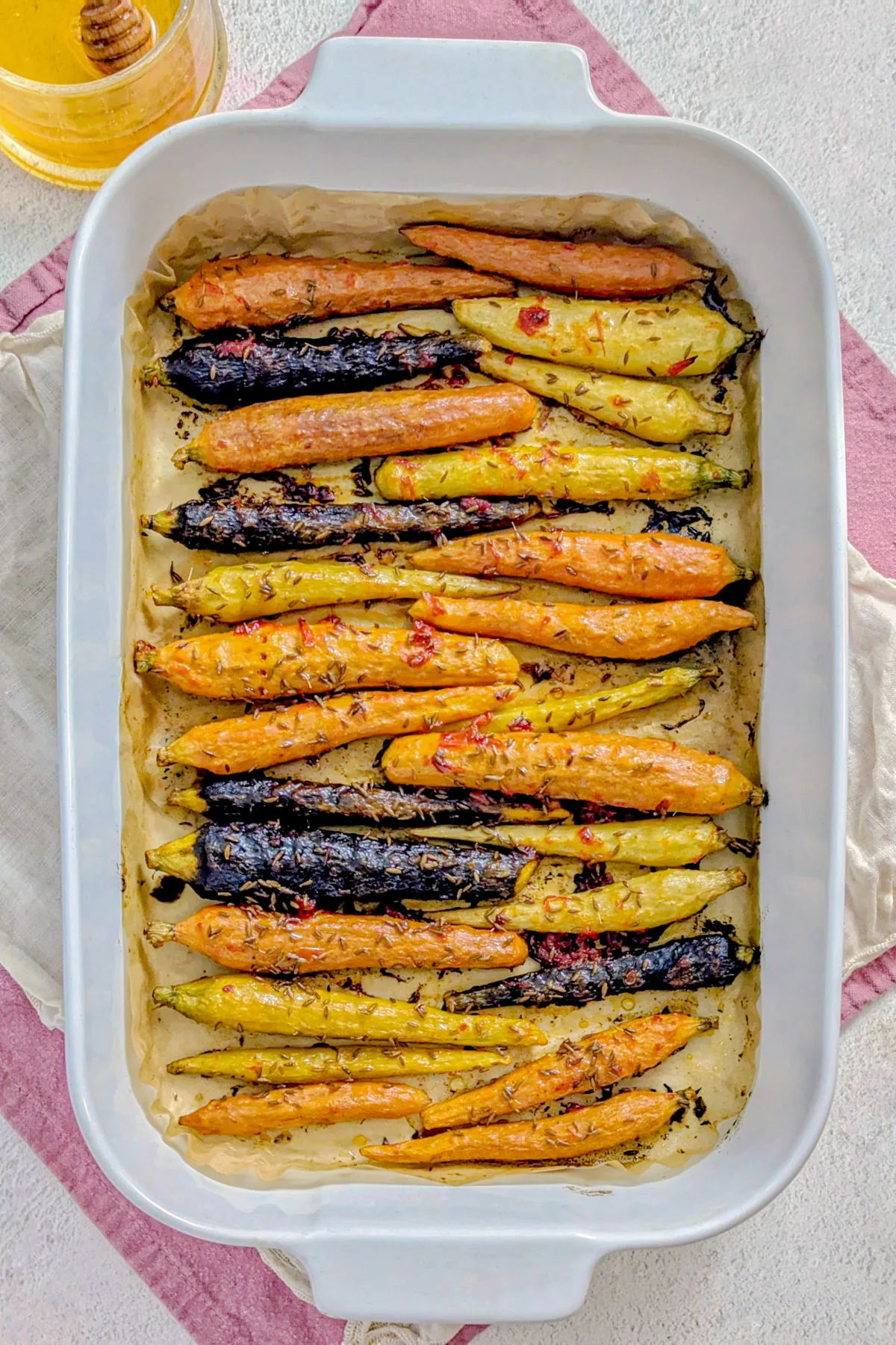 Harissa Carrots 5 Harissa carrots in a baking dish.